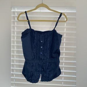 Blue ruffle button front tank top